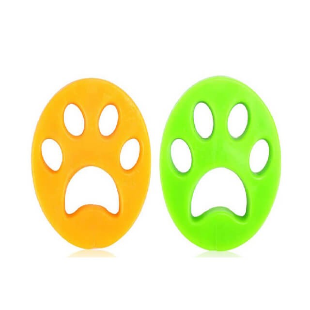 Green pet hair remover for laundry